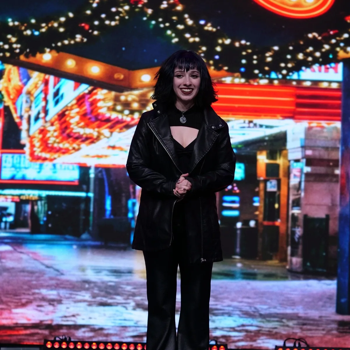 Performer Ari on stage at The Magic Studio Orlando